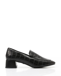 Black crocodile-patterned shoes on a white background
