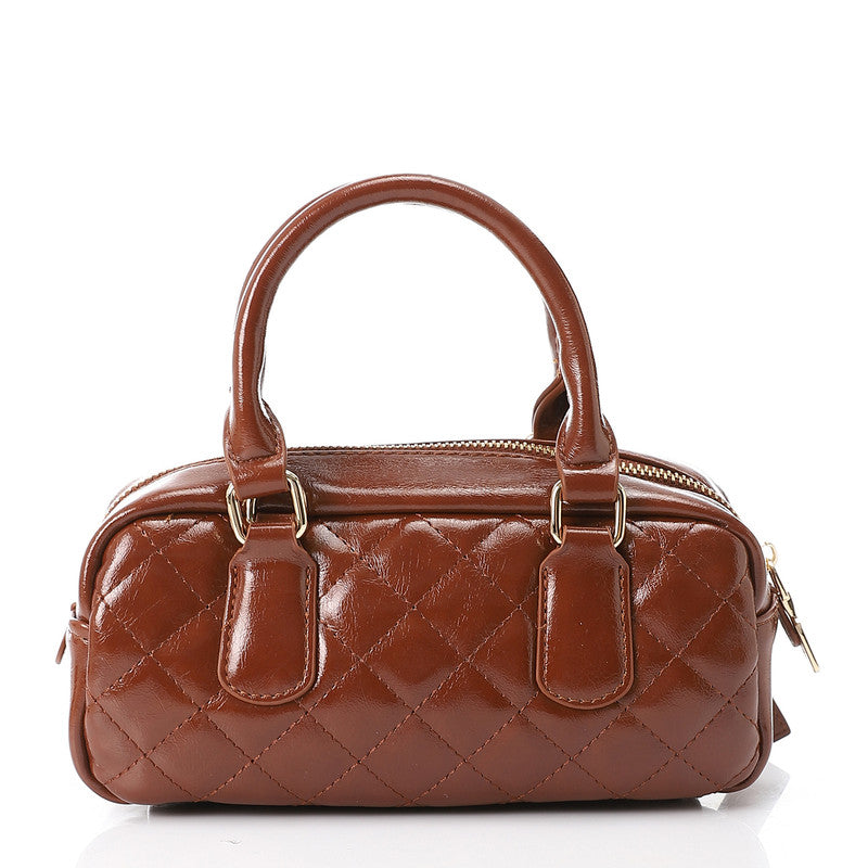 LID-DVTX-029  Quilted Bowler Shinny Handbag